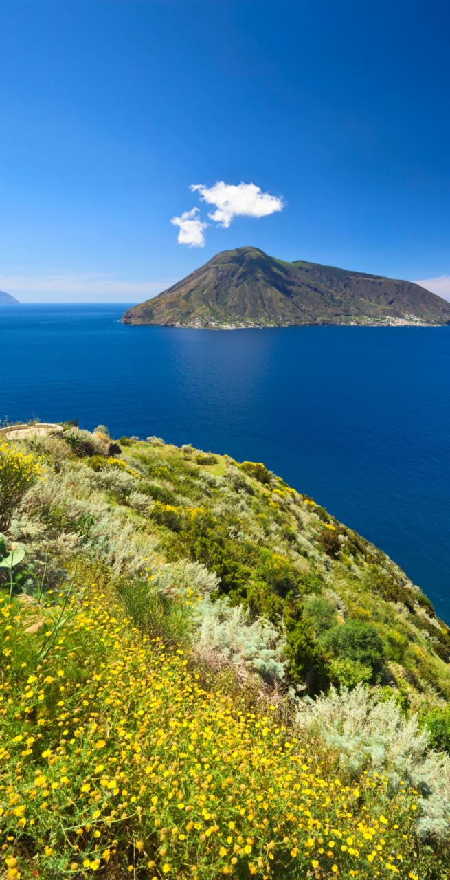 view of aeolian islands in sicily with blue sky