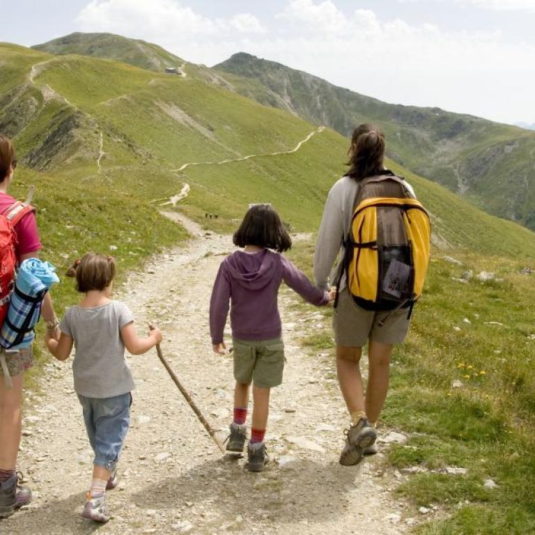 family trips hiking on mountain path