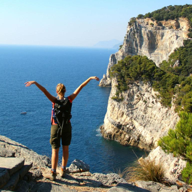 woman on self-guided tour on the sea