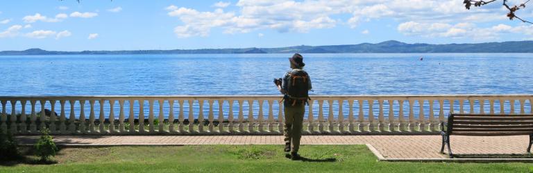 man admiring the bolsena lake during via francigena