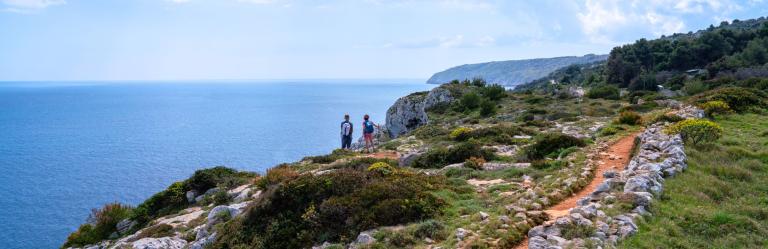 Via Costa Salentina woman on seaside path