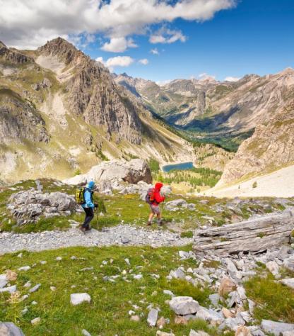 hikers walking the heart of dolomites
