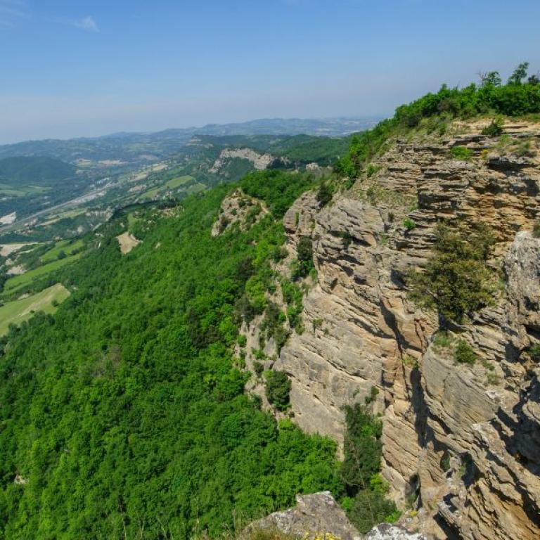 Rocky cliffs of Contrafforte Pliocenico nature reserve Via degli Dei