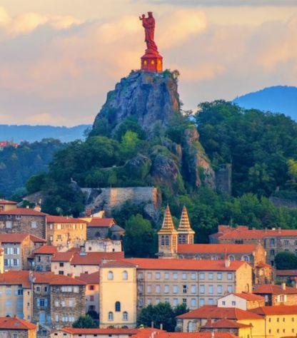 le puy en velay statue on the top of the rock