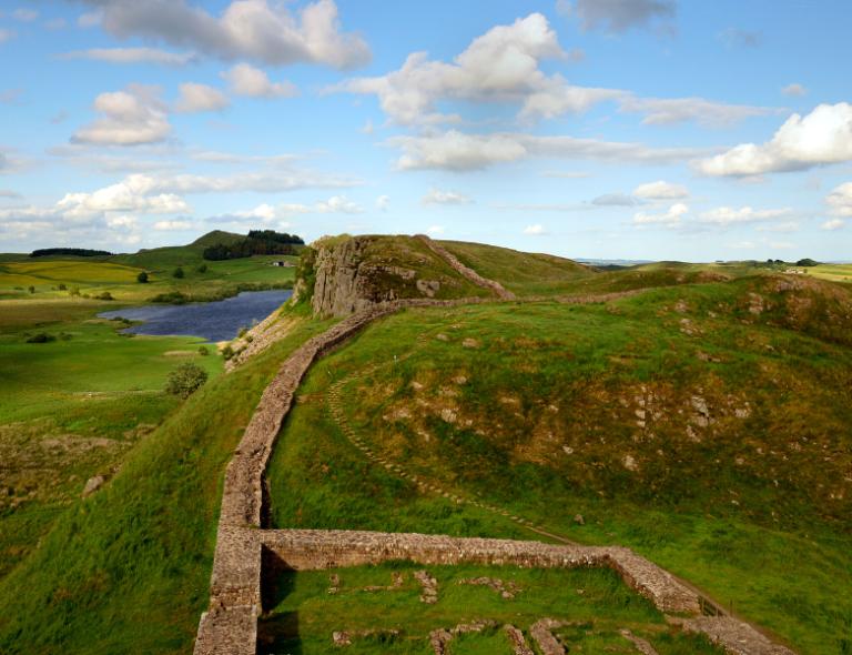 hadrian's wall in uk with blue sky above