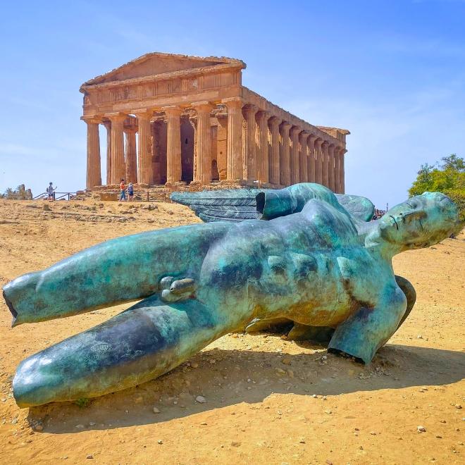 Ancient Temple of Concordia in Agrigento, Sicily, with the statue of Icarus a must-see stop during hiking in Sicily