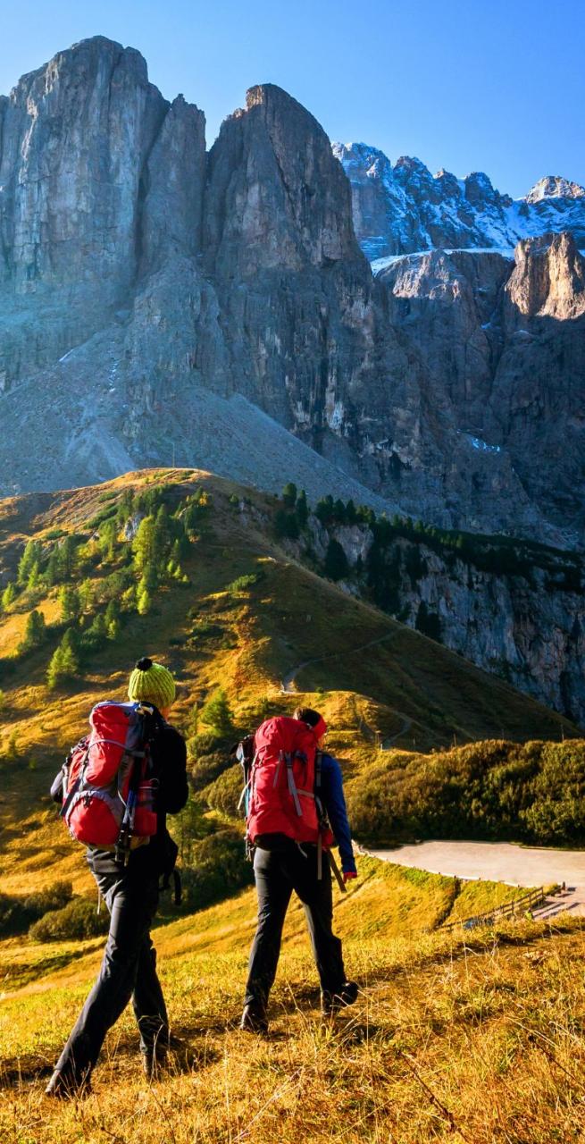 backpacking trips couple walkers on francigena path