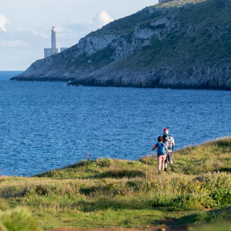 salento coast woman walking the path