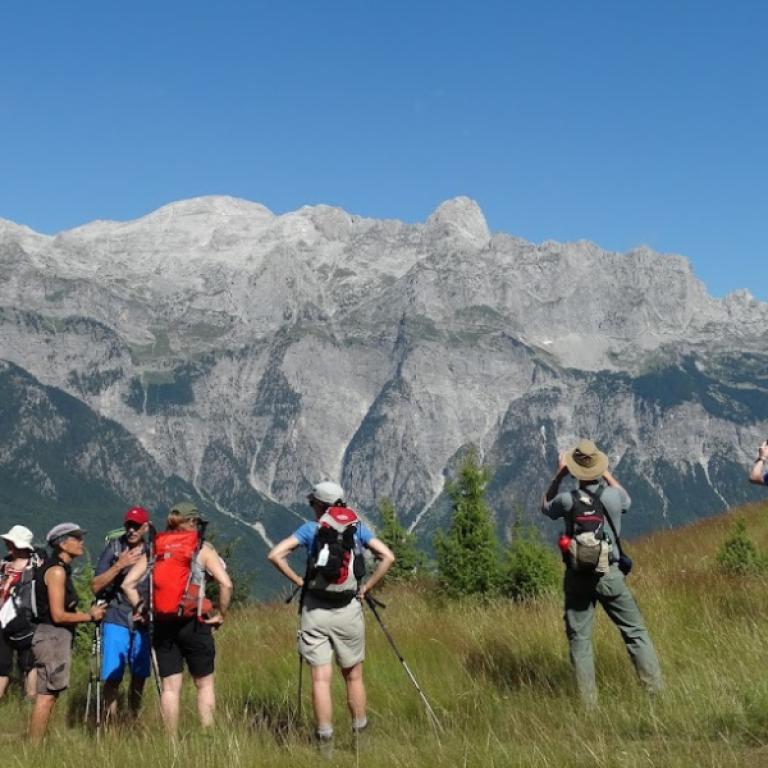 Albania Alps trail walkers admiring mountains