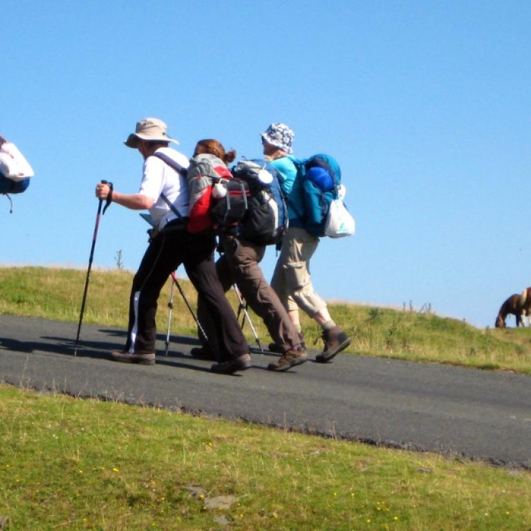 a group walk to santiago