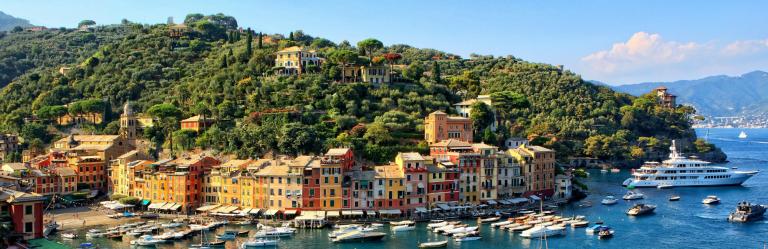 a scenic view of Portofino with colorful houses starting point for a trekking cinque terre