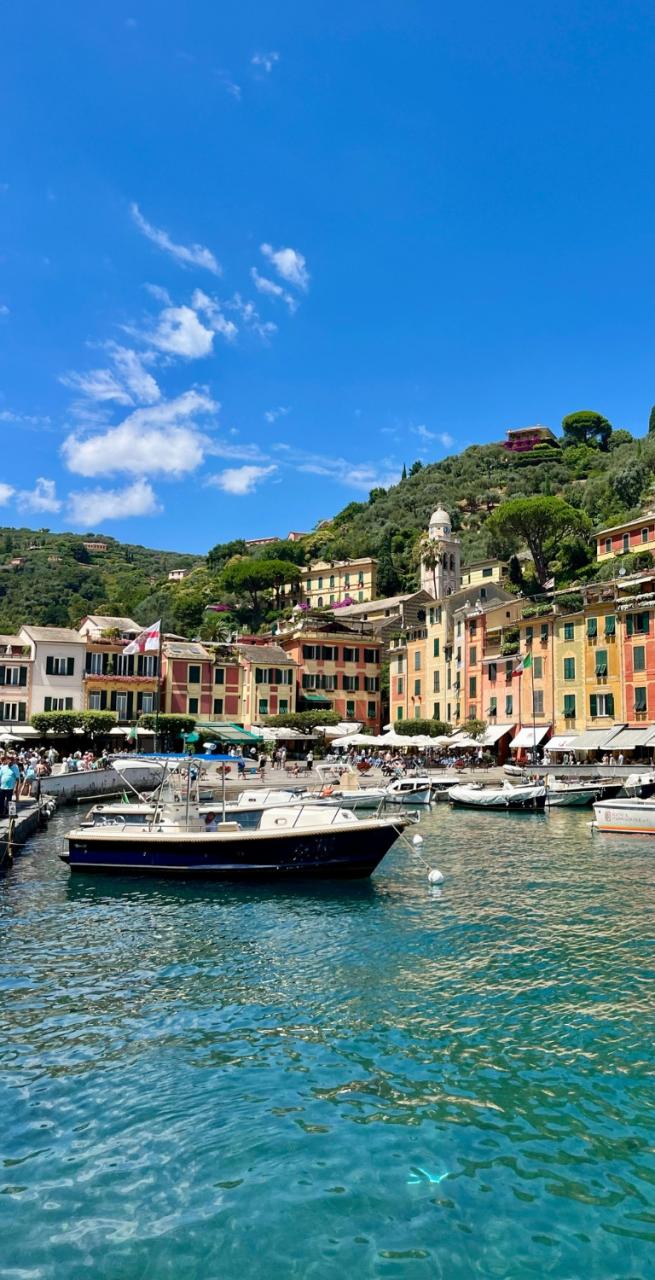 a scenic view of Portofino with colorful houses starting point for a trekking cinque terre