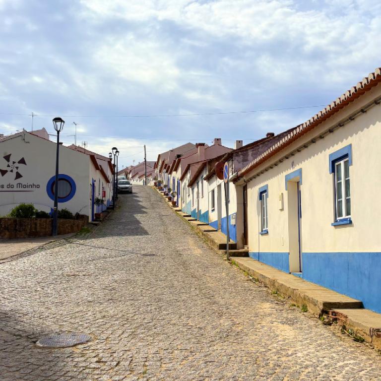 Traditional white-and-blue Portuguese village along the Fisherman’s Trail